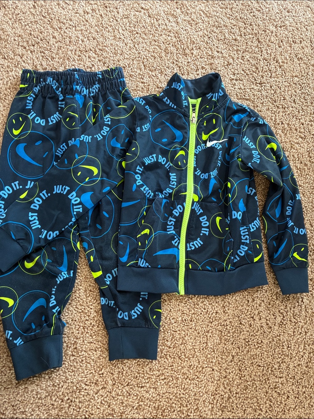 Nike Kids Black Tracksuit with Blue & Neon Green Smiley Print